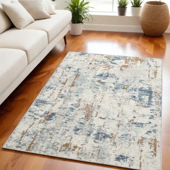 Beige and Blue Abstract Power Loom Area Rug Photo 1