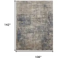 Photo of Beige and Blue Abstract Power Loom Distressed Area Rug