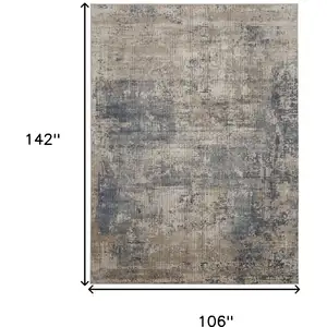 Photo of Beige and Blue Abstract Power Loom Distressed Area Rug