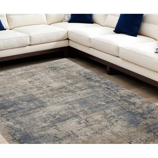 Beige and Blue Abstract Power Loom Distressed Area Rug Photo 1