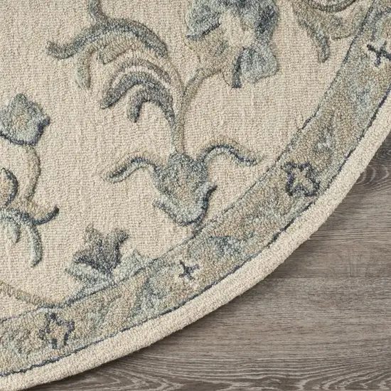 Beige and Blue Filigree Area Rug Photo 6