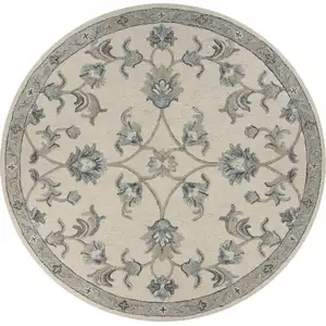 Photo of Beige and Blue Filigree Area Rug