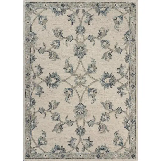 Beige and Blue Filigree Area Rug Photo 1