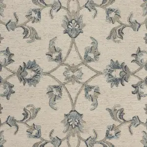 Photo of Beige and Blue Filigree Area Rug