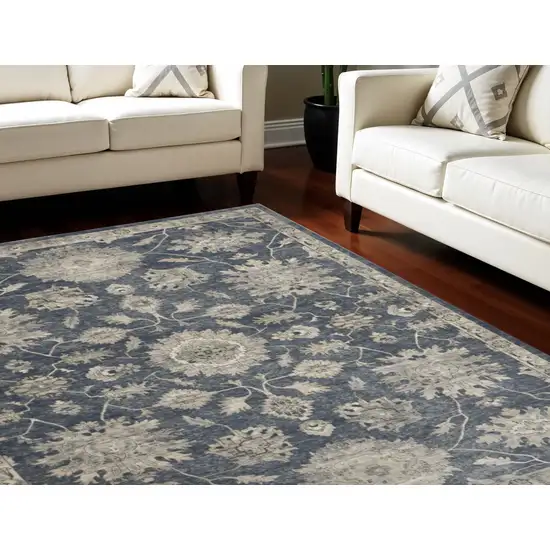 Beige and Blue Floral Medallion Power Loom Area Rug Photo 1