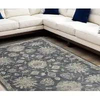 Photo of Beige and Blue Floral Medallion Power Loom Area Rug