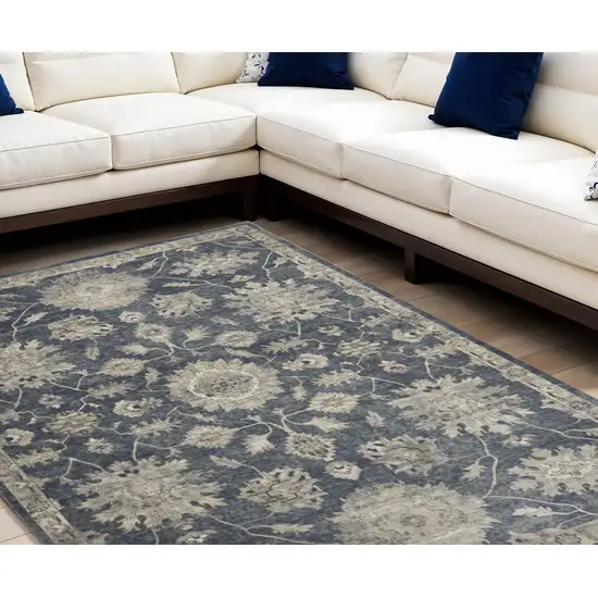 Beige and Blue Floral Medallion Power Loom Area Rug Photo 1