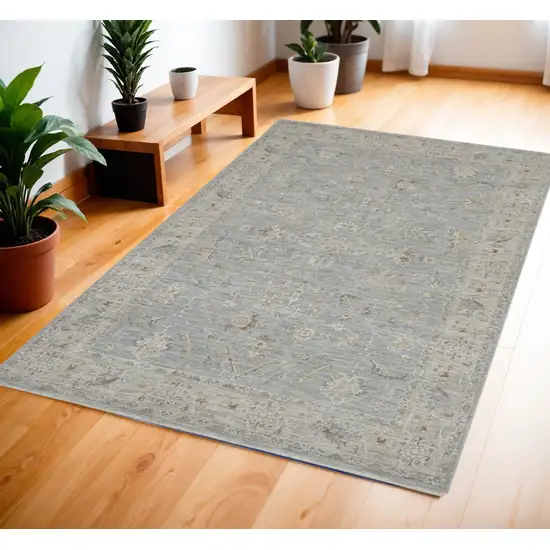 Beige and Blue Floral Power Loom Area Rug Photo 1