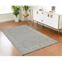 Photo of Beige and Blue Floral Power Loom Area Rug