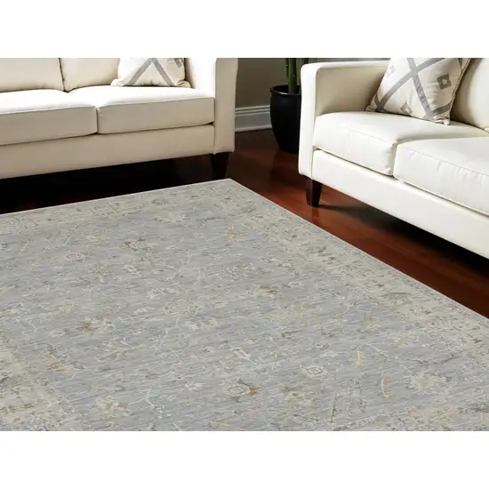 Beige and Blue Floral Power Loom Area Rug Photo 1