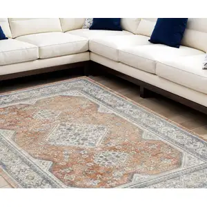 Photo of Beige and Bronze Oriental Power Loom Area Rug