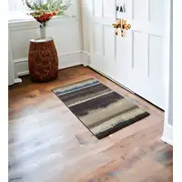 Photo of Beige and Brown Abstract Area Rug