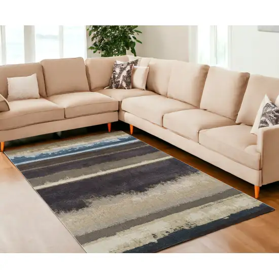 Beige and Brown Abstract Area Rug Photo 1