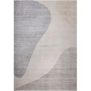 Photo of Beige and Brown Abstract Area Rug