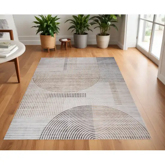 Beige and Brown Abstract Distressed Area Rug Photo 1