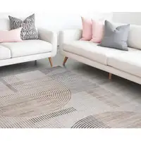 Photo of Beige and Brown Abstract Distressed Area Rug