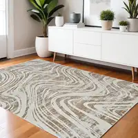 Photo of Beige and Brown Abstract Distressed Area Rug