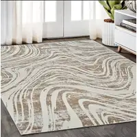 Photo of Beige and Brown Abstract Distressed Area Rug