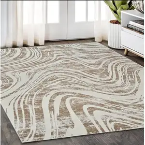 Photo of Beige and Brown Abstract Distressed Area Rug