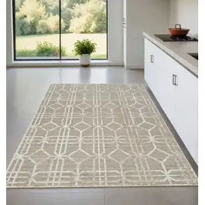 Photo of Beige and Brown Abstract Distressed Area Rug