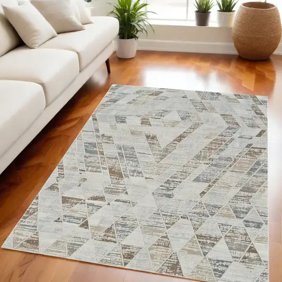 Beige and Brown Abstract Distressed Area Rug Photo 1