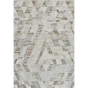 Photo of Beige and Brown Abstract Distressed Area Rug