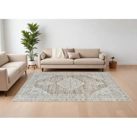 Beige and Brown Abstract Distressed Area Rug Photo 1