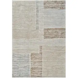 Photo of Beige and Brown Abstract Distressed Area Rug