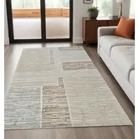 Photo of Beige and Brown Abstract Distressed Area Rug