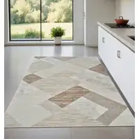 Photo of Beige and Brown Abstract Distressed Area Rug