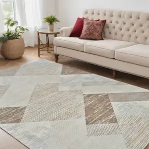 Photo of Beige and Brown Abstract Distressed Area Rug