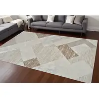 Photo of Beige and Brown Abstract Distressed Area Rug