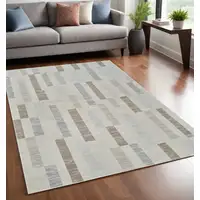 Photo of Beige and Brown Abstract Distressed Area Rug