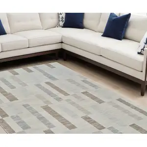 Photo of Beige and Brown Abstract Distressed Area Rug