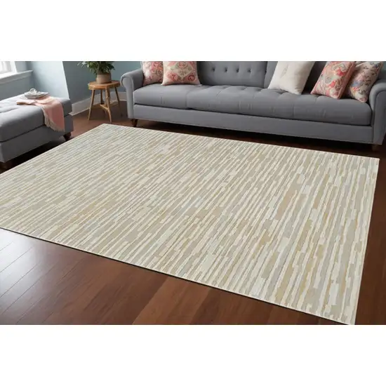 Beige and Brown Abstract Distressed Area Rug Photo 1