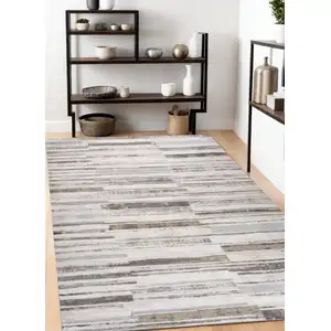 Photo of Beige and Brown Abstract Distressed Area Rug