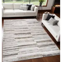 Photo of Beige and Brown Abstract Distressed Area Rug