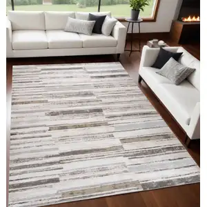 Photo of Beige and Brown Abstract Distressed Area Rug