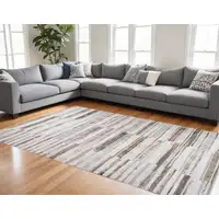 Photo of Beige and Brown Abstract Distressed Area Rug