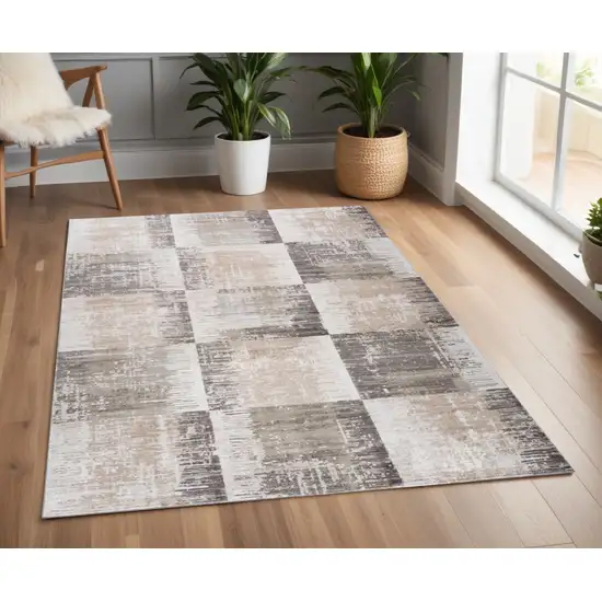 Beige and Brown Abstract Distressed Area Rug Photo 1