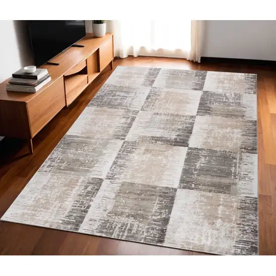 Beige and Brown Abstract Distressed Area Rug Photo 1