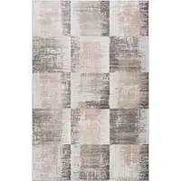 Photo of Beige and Brown Abstract Distressed Area Rug