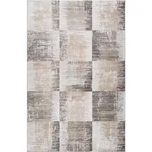 Photo of Beige and Brown Abstract Distressed Area Rug