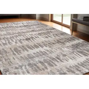 Photo of Beige and Brown Abstract Distressed Area Rug