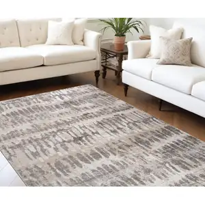 Photo of Beige and Brown Abstract Distressed Area Rug