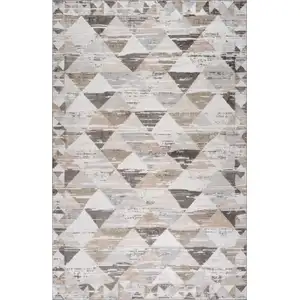 Photo of Beige and Brown Abstract Distressed Area Rug