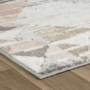 Photo of Beige and Brown Abstract Distressed Area Rug