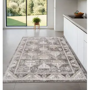 Photo of Beige and Brown Abstract Distressed Area Rug