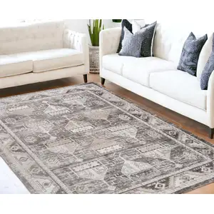 Photo of Beige and Brown Abstract Distressed Area Rug