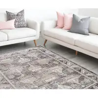 Photo of Beige and Brown Abstract Distressed Area Rug